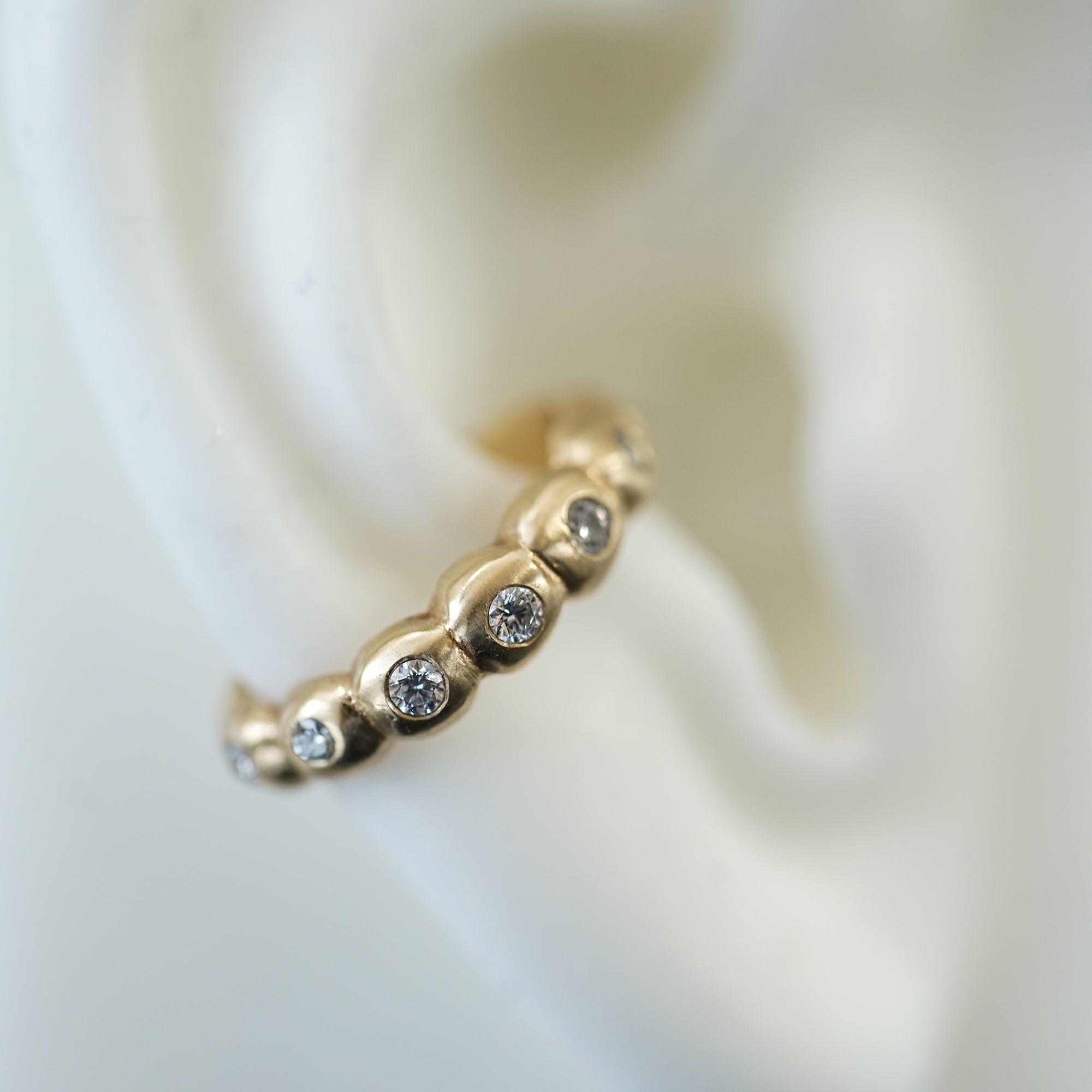 ear cuff in gold with white diamonds