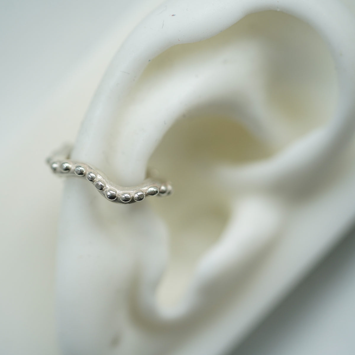 Wavy silver ear cuff