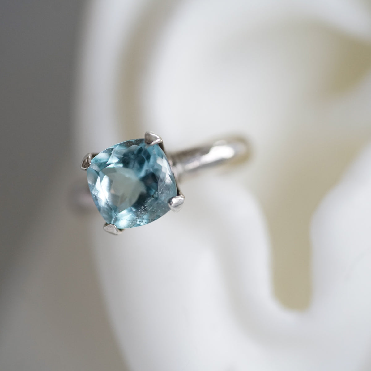 blue topaz square cushion silver ear cuff