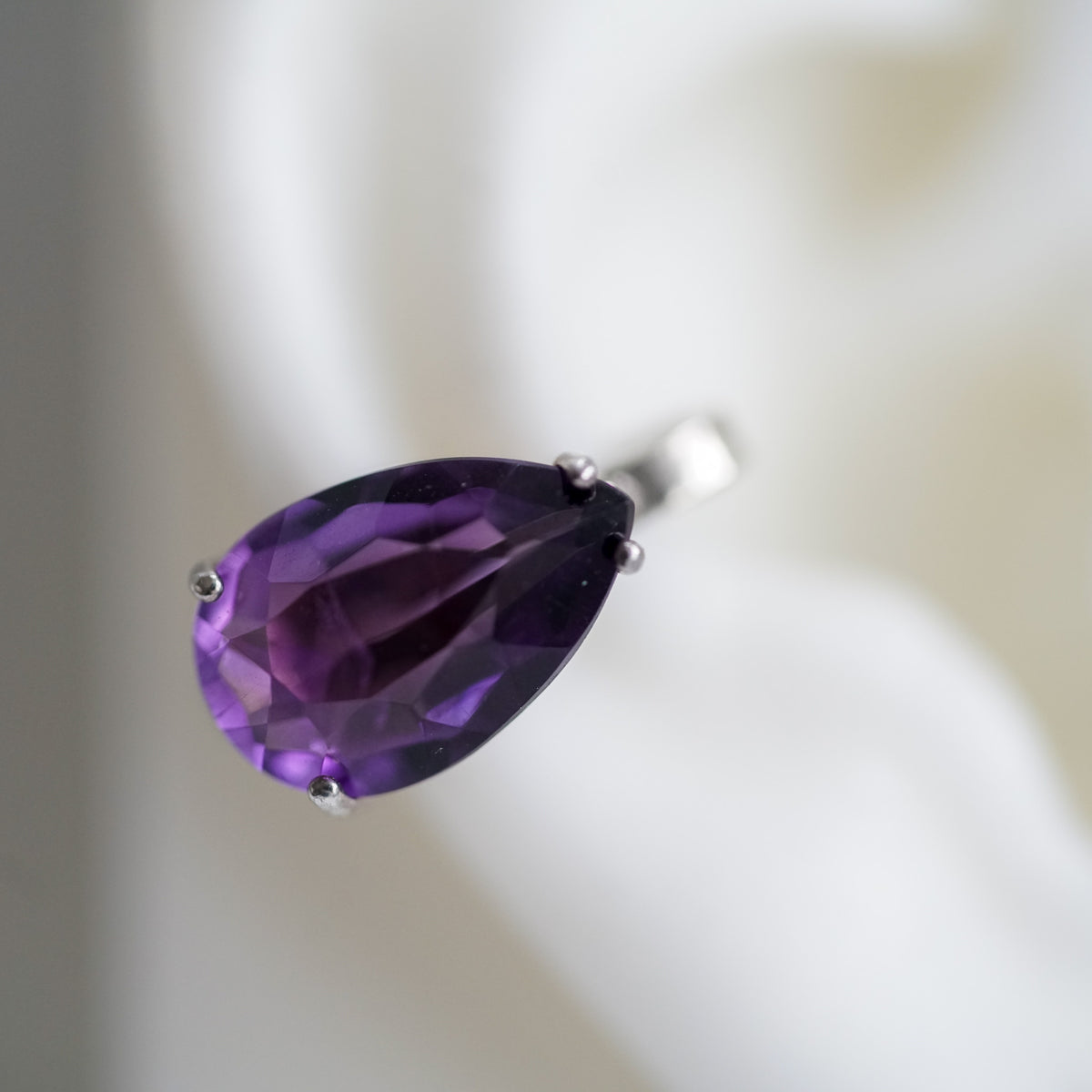 amethyst silver cuff on a ear