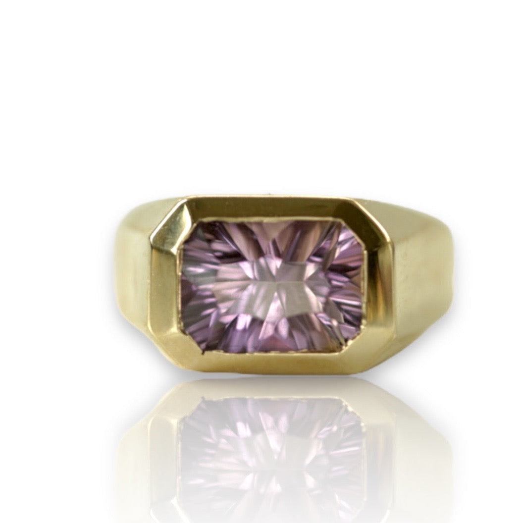 modern ring in gold set with an octagon ametrine 