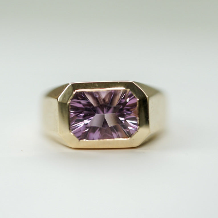 modern ring in gold set with an octagon ametrine 